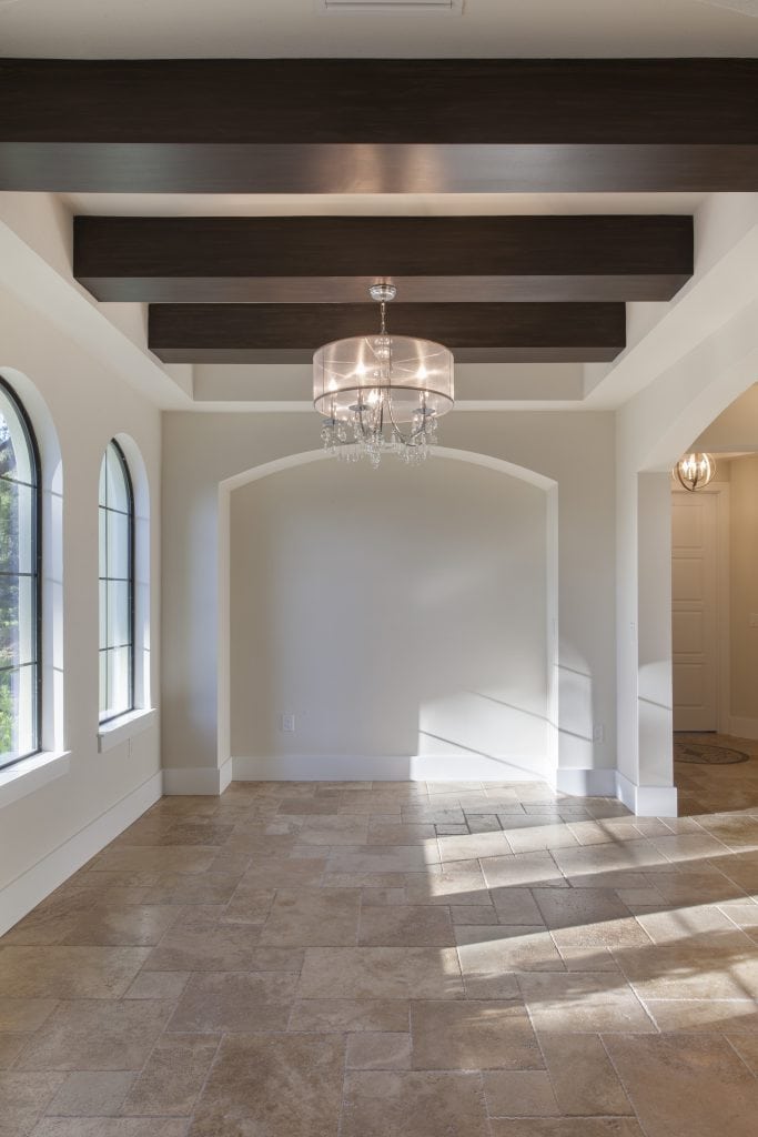The formal dining room in this Lake Nona home designed and built by Orlando Custom Home Builder Jorge Ulibarri. 