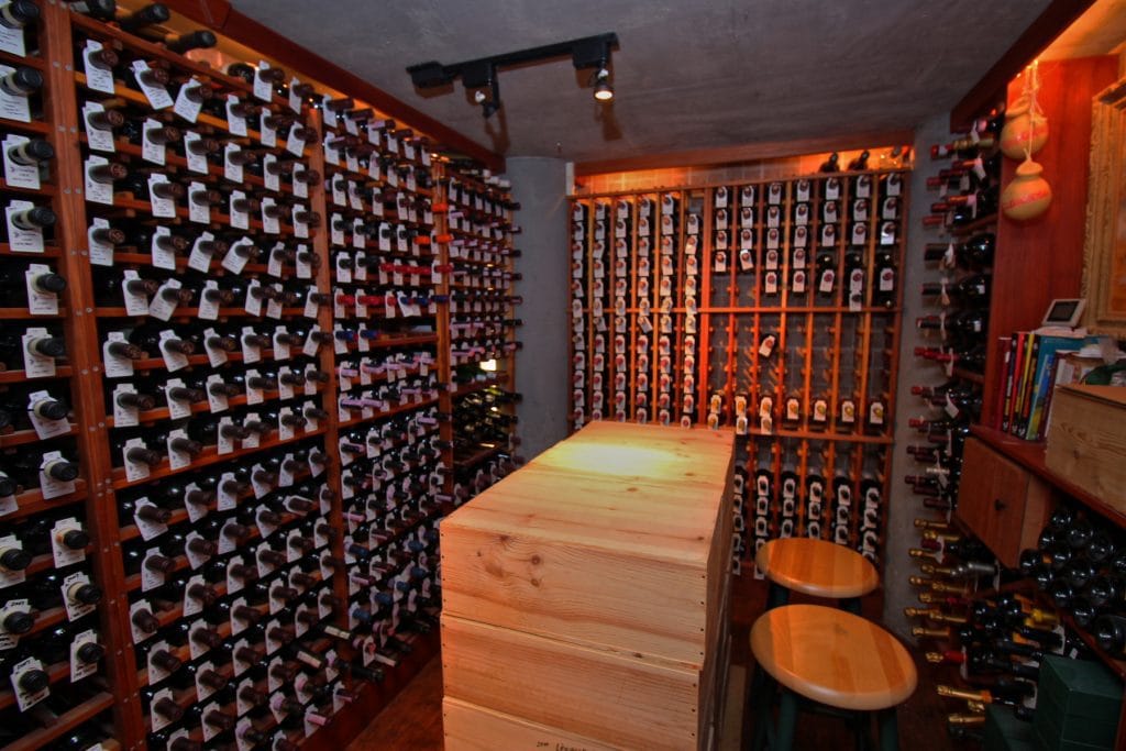 Individual storage racks in a temperature controlled wine room. For more design tips and advice on building a custom home, check out the blog by Orlando Custom Home Builder Jorge Ulibarri at www.imyourbuilder.com