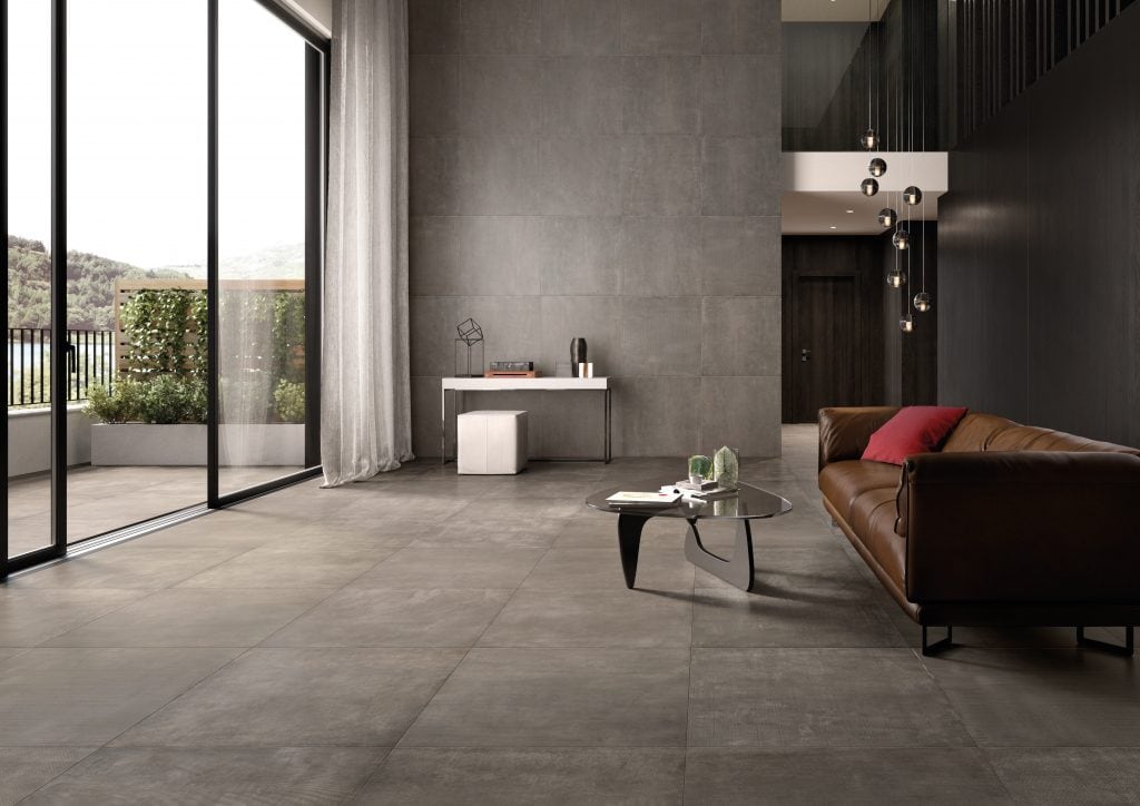 Orlando Custom Home Builder Jorge Ulibarri shares flooring tips for various stone and ceramic tile choices including Ceramic tile that looks like concrete from the Network collection by Cerdisa. Photo credit: Cersaie 