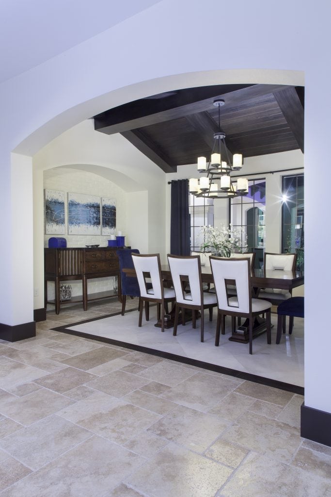 The only formal living space is the dining room in Villa Sirena, an Orlando Custom Home that is a blend of Spanish Mission Architecture and Contemporary design elements by Orlando Custom Home Builder Jorge Ulibarri of Cornerstone Custom Construction