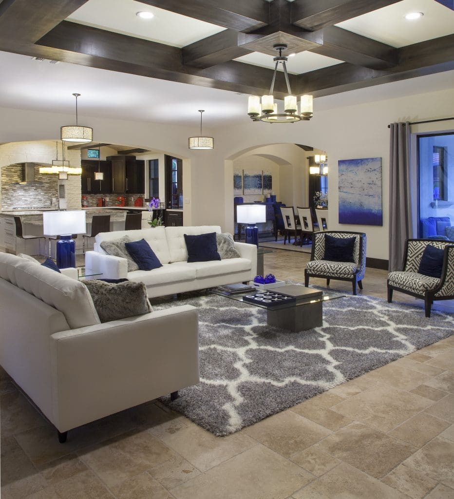 The family room or great room in Villa Sirena, an Orlando Custom Home that is a blend of Spanish Mission Architecture and Contemporary design elements by Orlando Custom Home Builder Jorge Ulibarri of Cornerstone Custom Construction