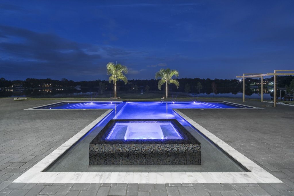 The linear pool and spa overlooking Lake Markham sit on a peninsula for sweeping views. 