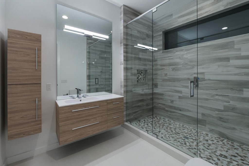  One of the six bathrooms in this 12,000 sq. ft. Florida Modern home by Orlando Custom Homebuilder Jorge Ulibarri. 