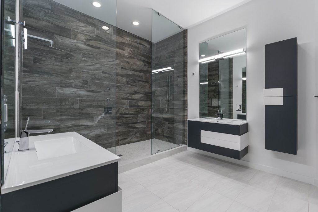  One of the six bathrooms in this 12,000 sq. ft. Florida Modern home by Orlando Custom Homebuilder Jorge Ulibarri. 