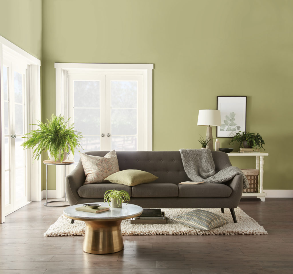 Family room painted in Behr paint's Back to Nature, 2020 Color of the Year.