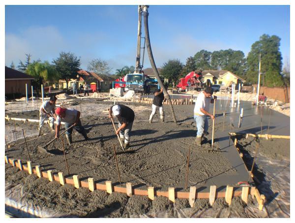 Concrete foundation pour at the Mission-Mod Blog House under construction by Orlando Custom Home Builder Jorge Ulibarri. Follow the step-by-step process as we document the construction of this 4,600 square foot custom home located in Heathrow, Florida.