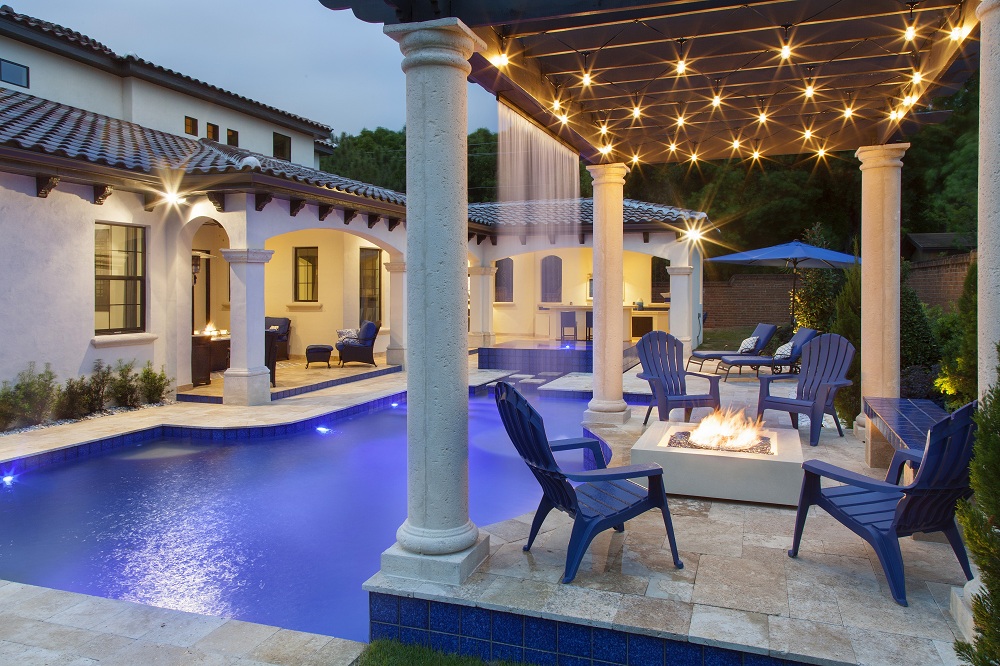 exterior luxury home pool, waterfall, firepit